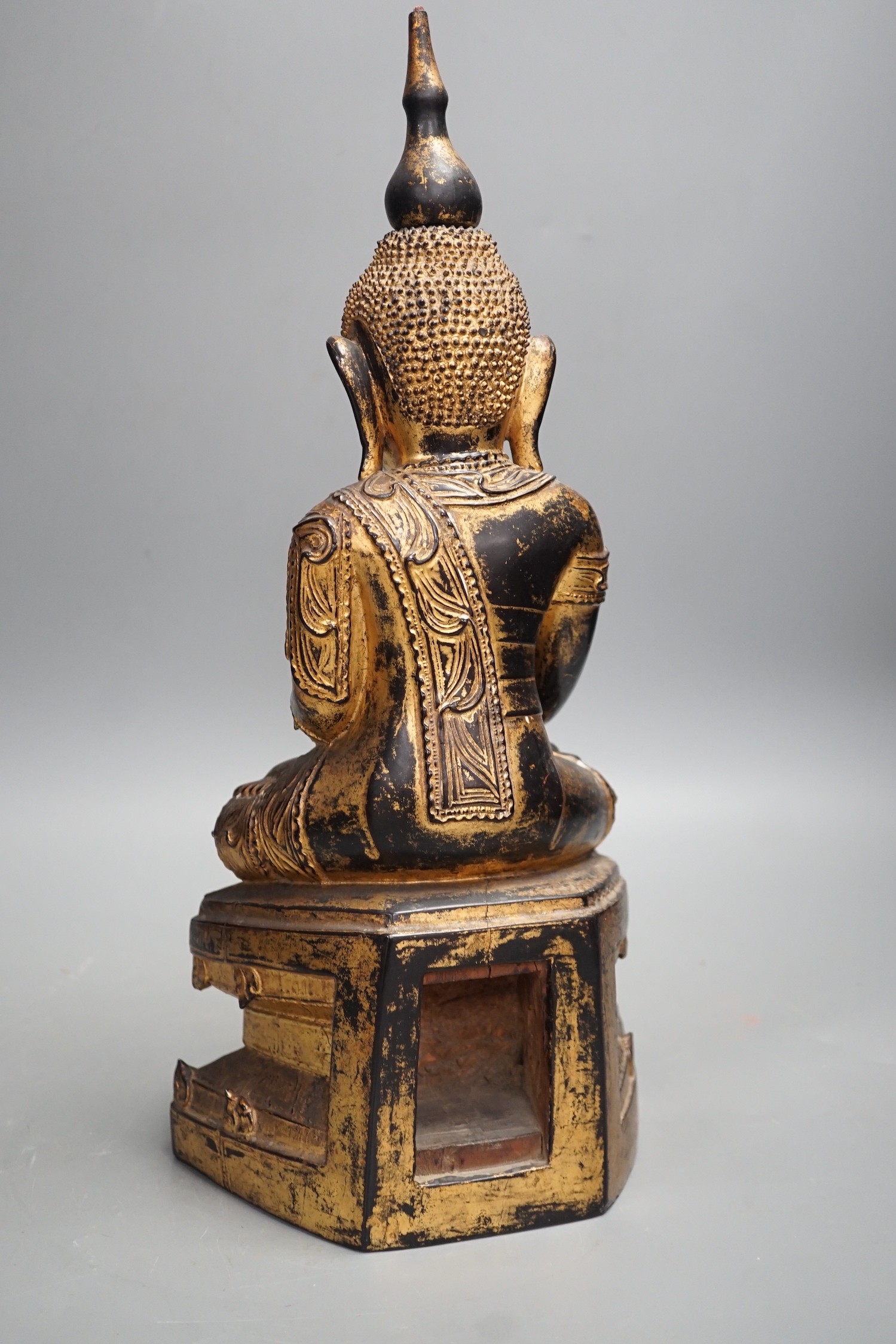 Two Thai gilt wood figures of Buddha, tallest 41cms high